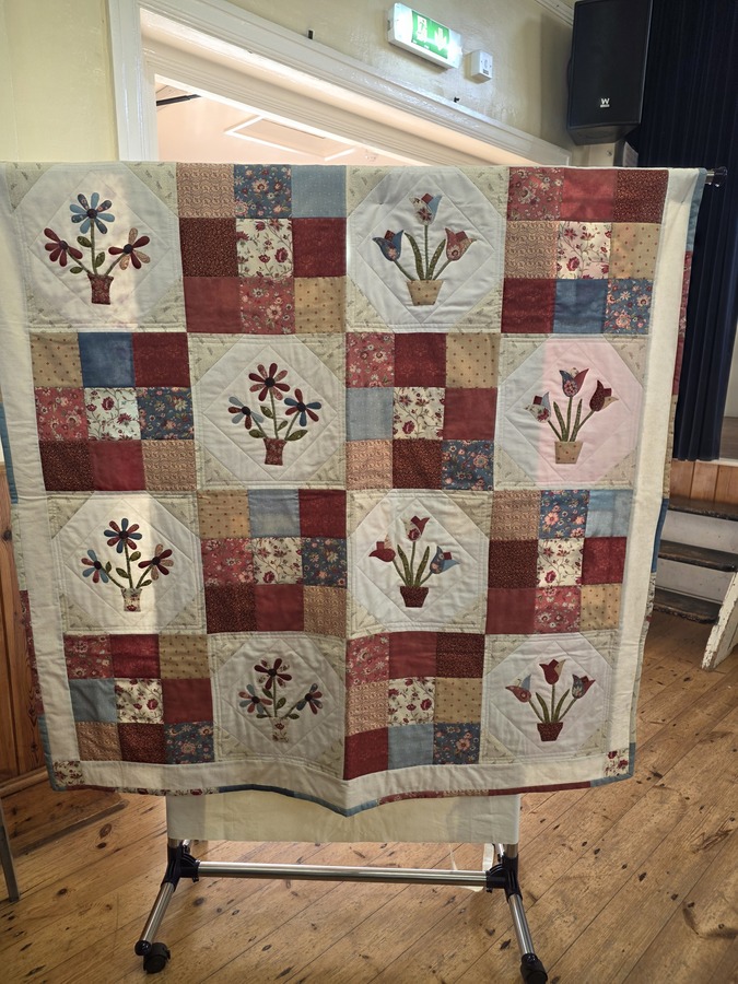 Jenny C's quilt made for home